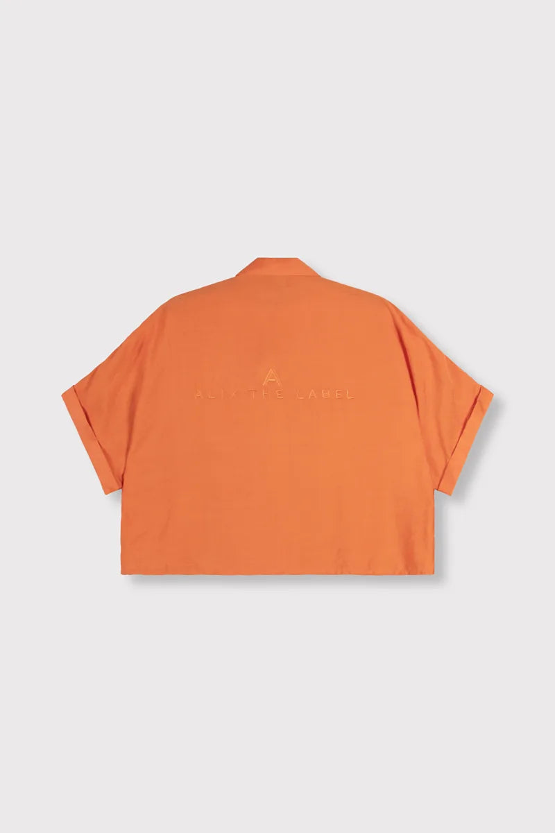 Ladies Woven Irregular Oversized Blouse van ALIX The Label, kleur Soft Orange